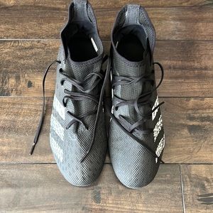 Lightly used predator freak.3 firm soccer cleats.